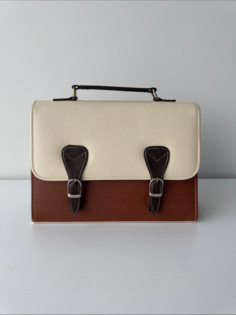 2010’s structured satchel top handle and cross body